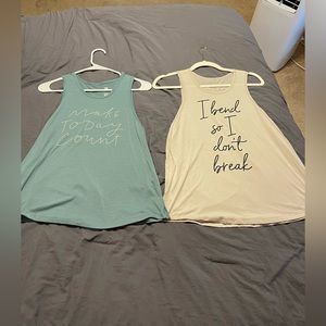 Two Size Women’s XS all in motion graphic workout tanks